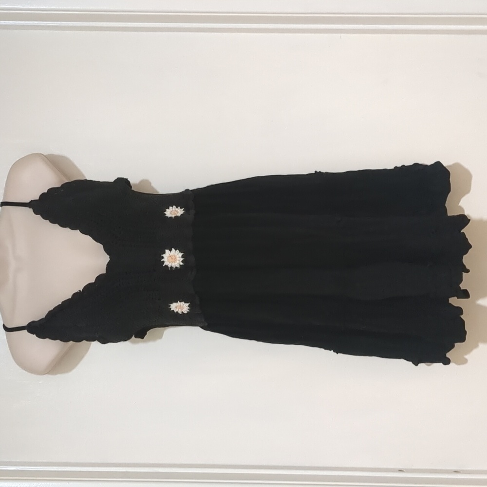 Indulge in style black knit mini dresses size L